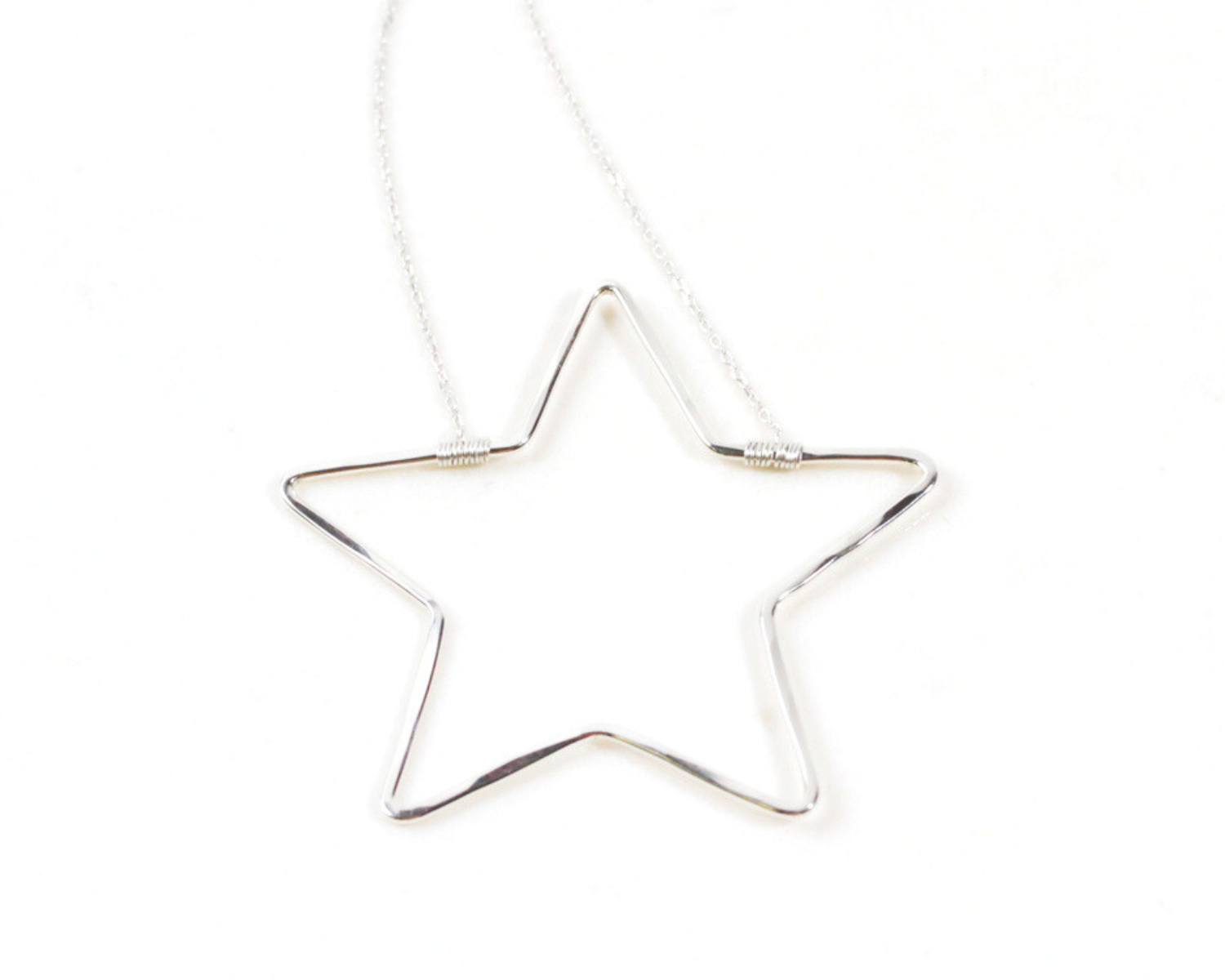 Every aspect of this celestial treasure is intentional. The 1mm chain is expertly wire wrapped to the star pendant for enduring strength. Have your Shining Star Necklace handcrafted in 925 Sterling Silver or 14 karat Gold Filled.