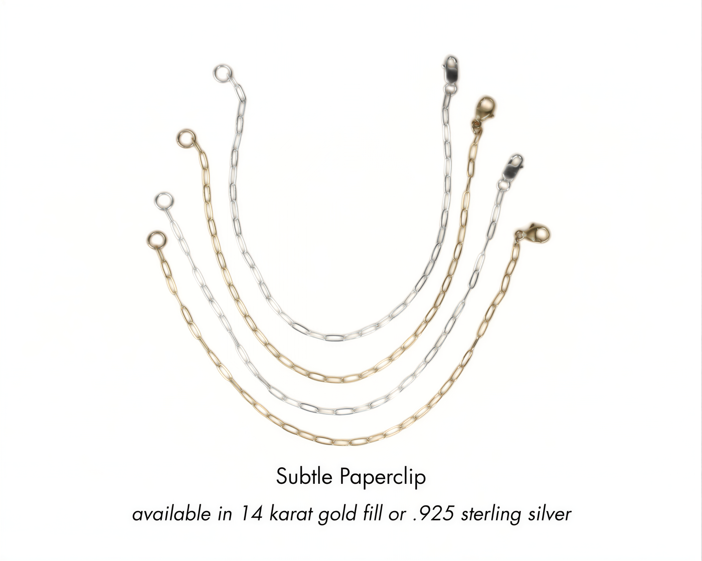 a collection of various chain links in different colors, including gold, silver, and white, arranged in a curved fashion.