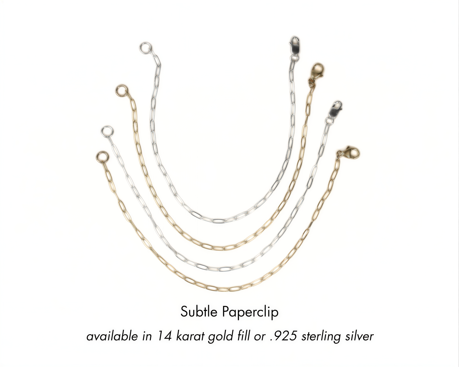 a collection of various chain links in different colors, including gold, silver, and white, arranged in a curved fashion.