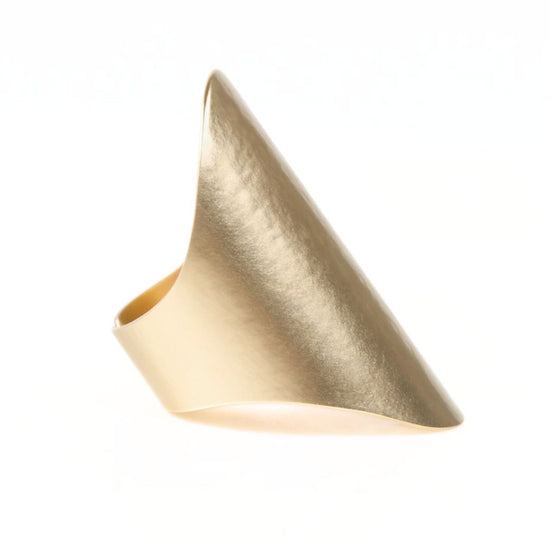 A bras ring with a unique, pointed shape.
