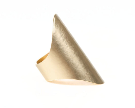 A bras ring with a unique, pointed shape.