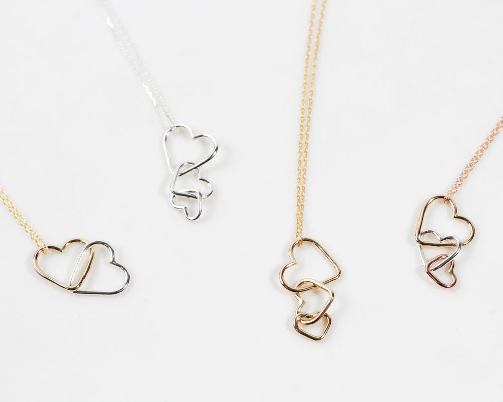 We love how these options allow you to perfectly represent your unique loved ones. Select 925 Sterling Silver, 14 karat Yellow Gold Filled or 14 karat Rose Gold Filled. This personalized hearts necklace makes a wonderful Mother’s Day gift.