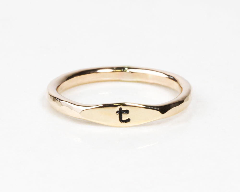What makes this initial ring truly special is that it can be personalized with the hand cast initial of your choice. You’ll find this simple and striking initial ring to be an essential everyday favorite, a perfect gift for any special occasion.