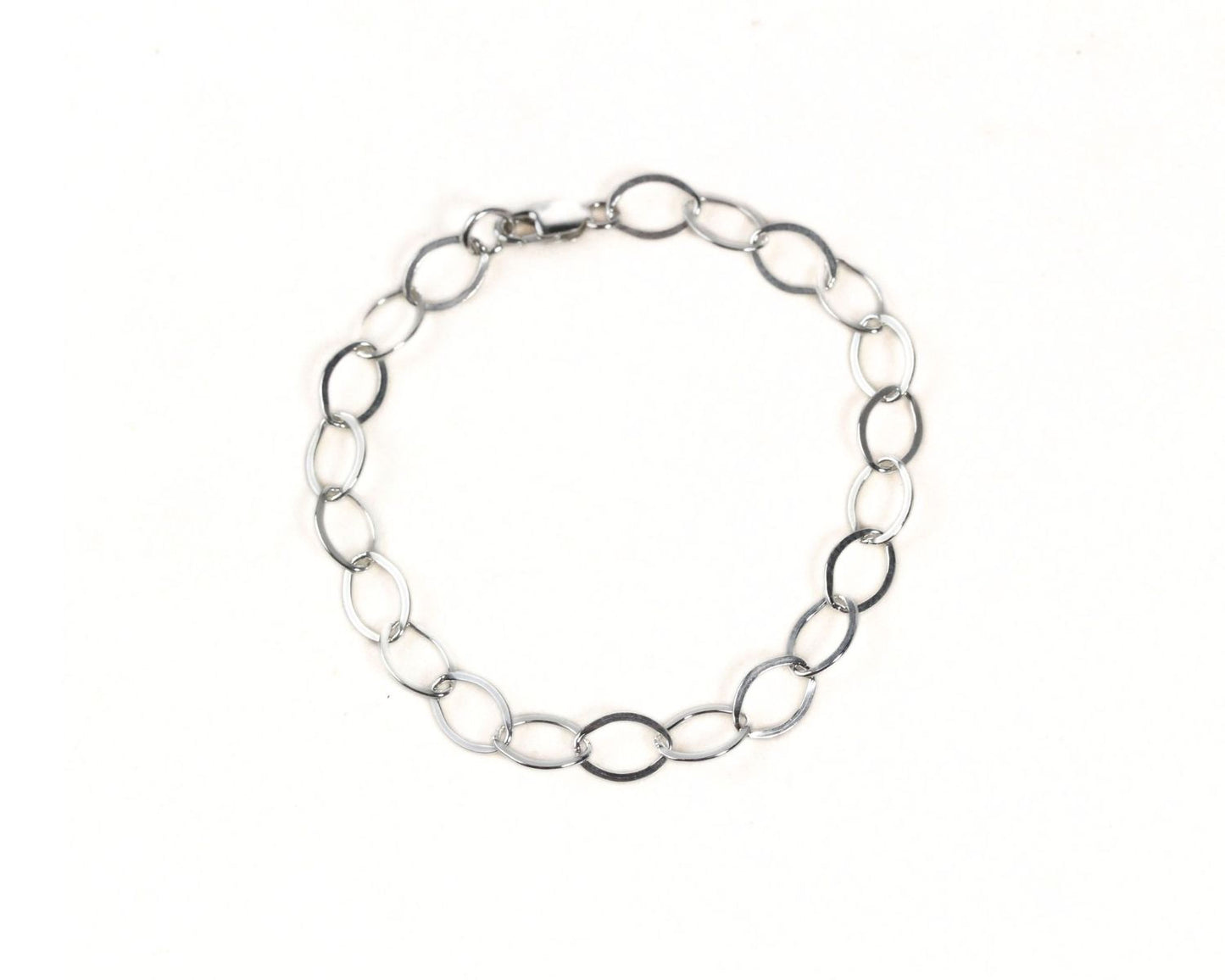 A silver chain bracelet with multiple circular links.