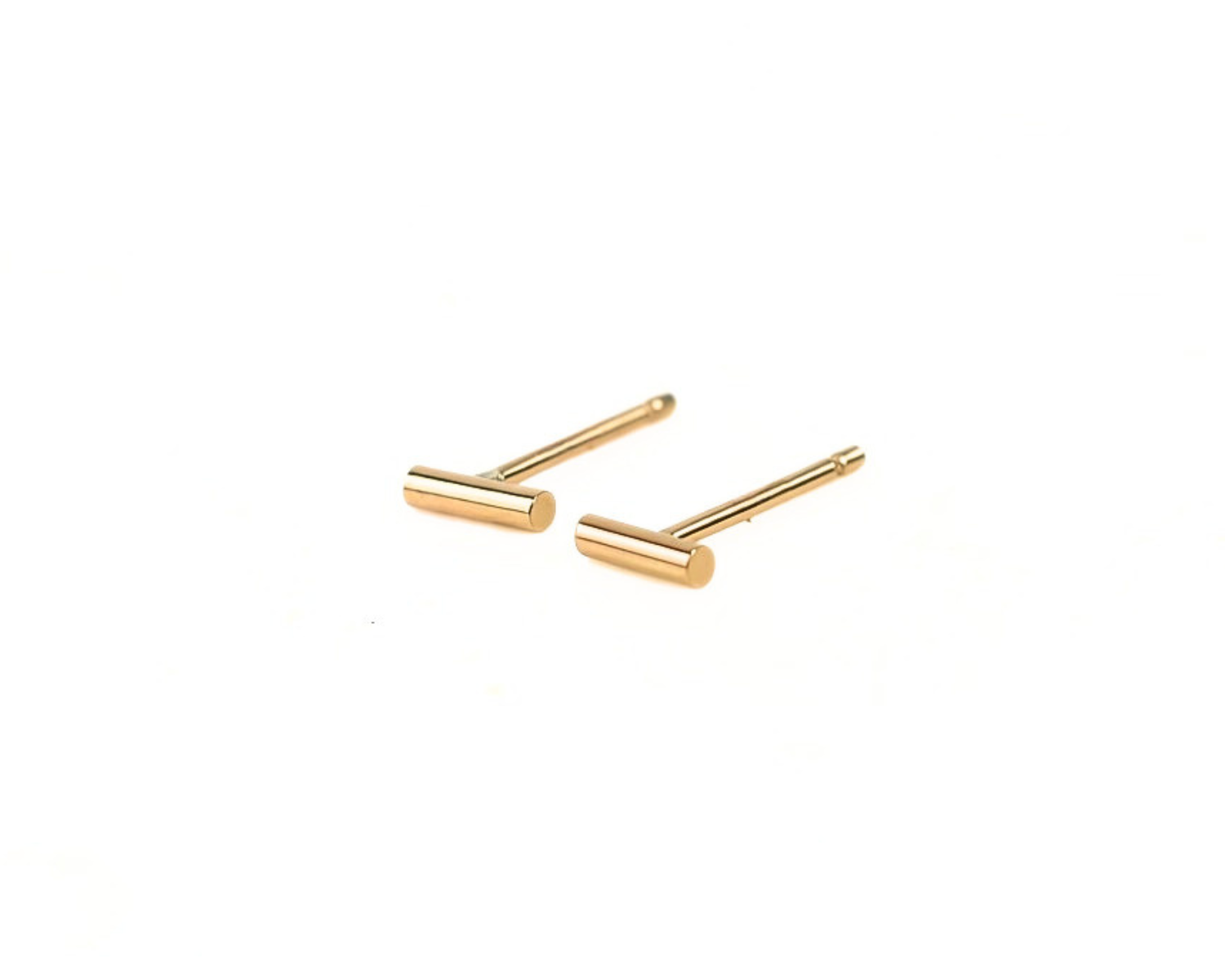 A pair of gold-colored earrings with a simple, minimalist design.