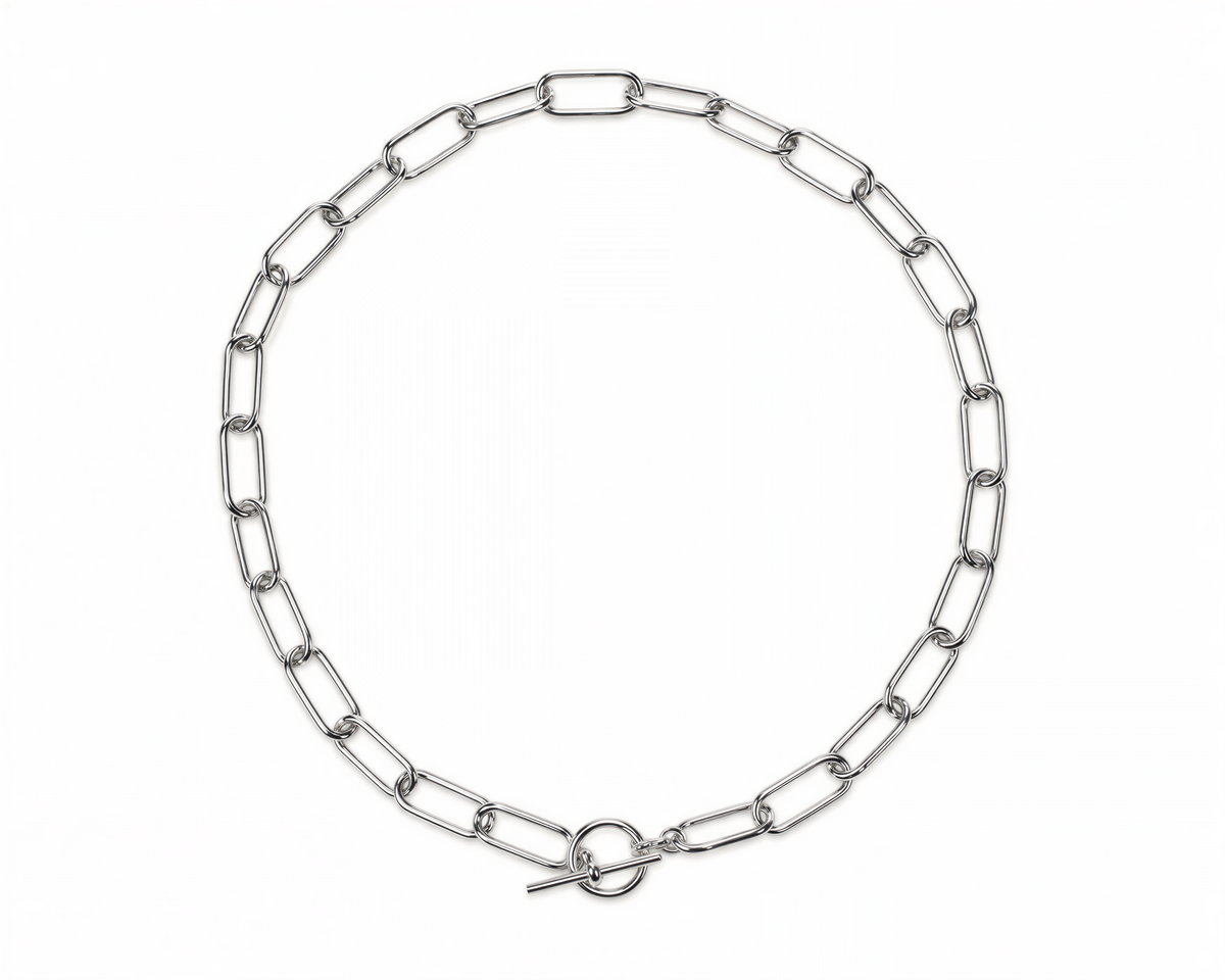 A silver chain necklace with a round clasp.