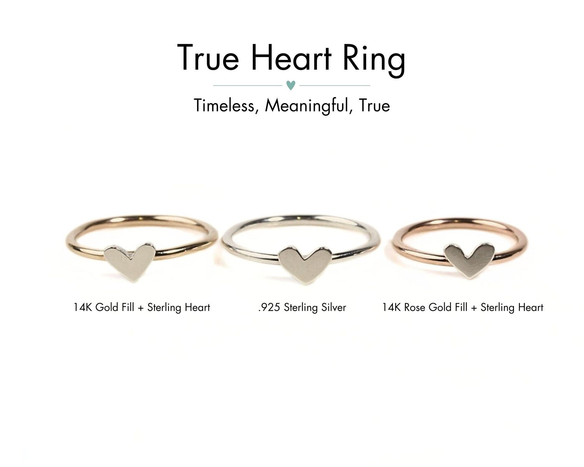 three rings with heart-shaped charms, each with a different fill material and description.