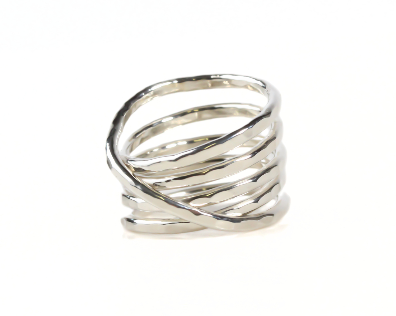 A silver ring with a twisted, coiled design.