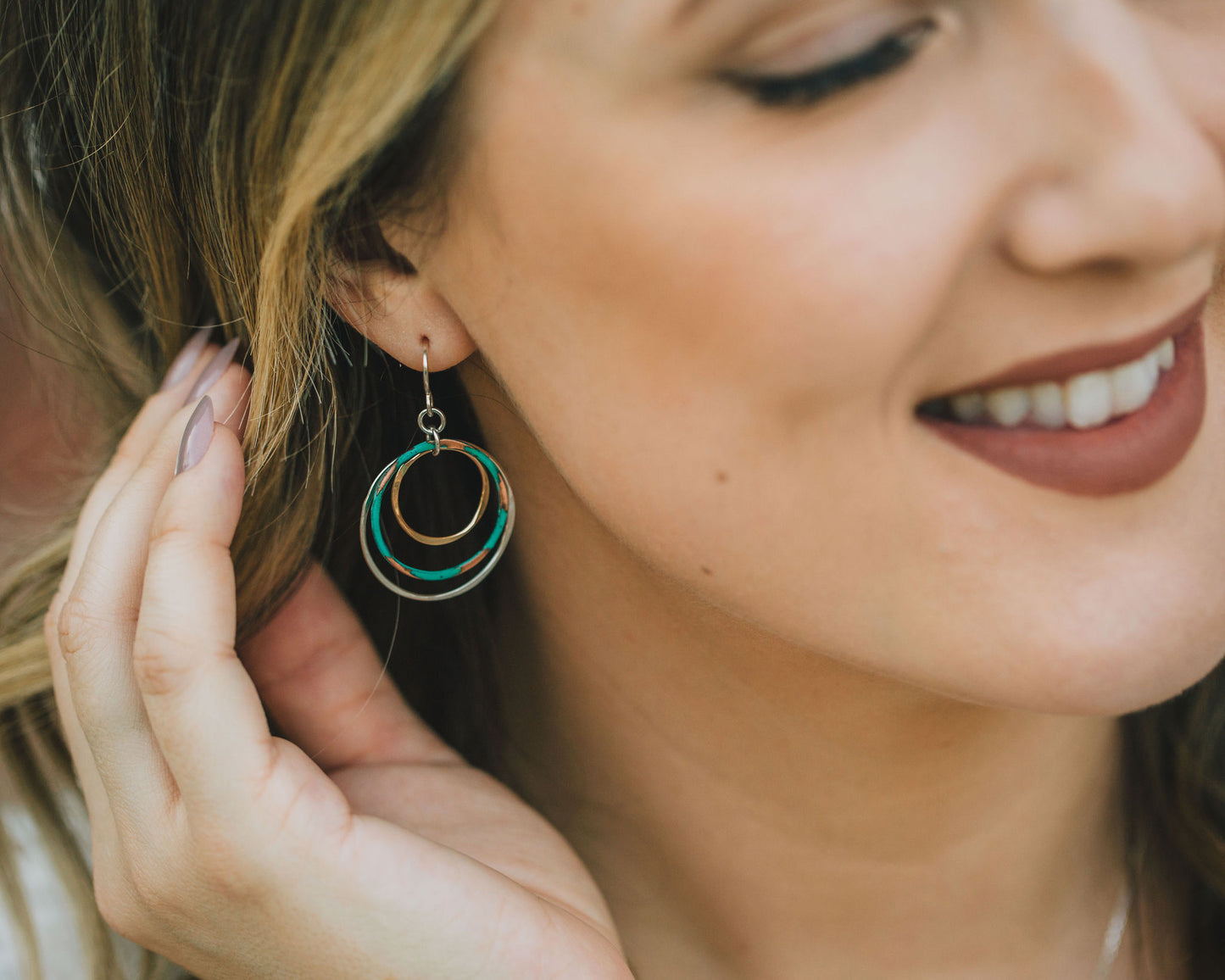 This design is lightweight and highly wearable. The mixed metal composition compliments any ensemble and the Mint patina offers an eye-catching surprise. These lively and luxurious mixed metal earrings are destined to become an instant favorite.