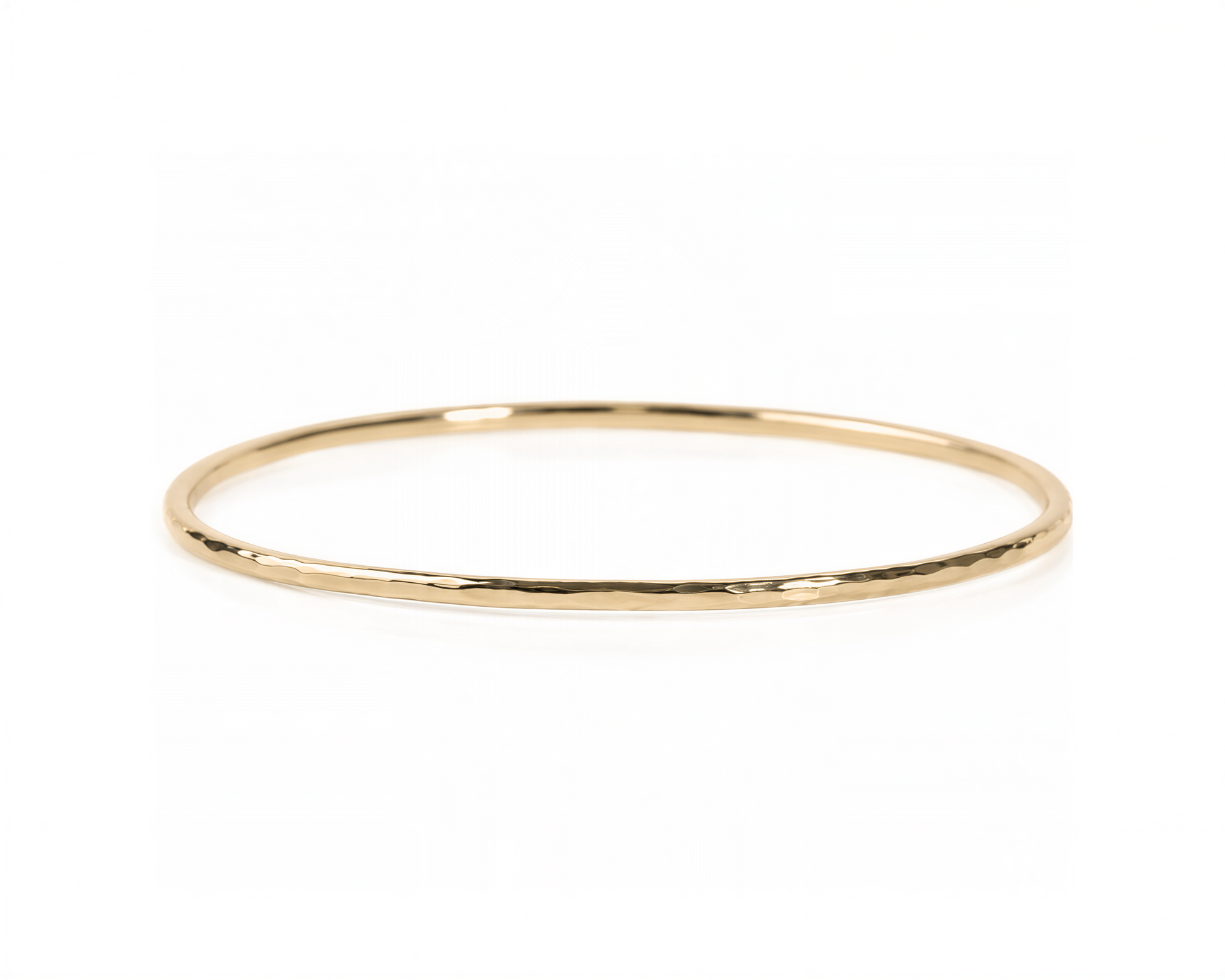A simple gold-colored bangle bracelet is shown against a white background.