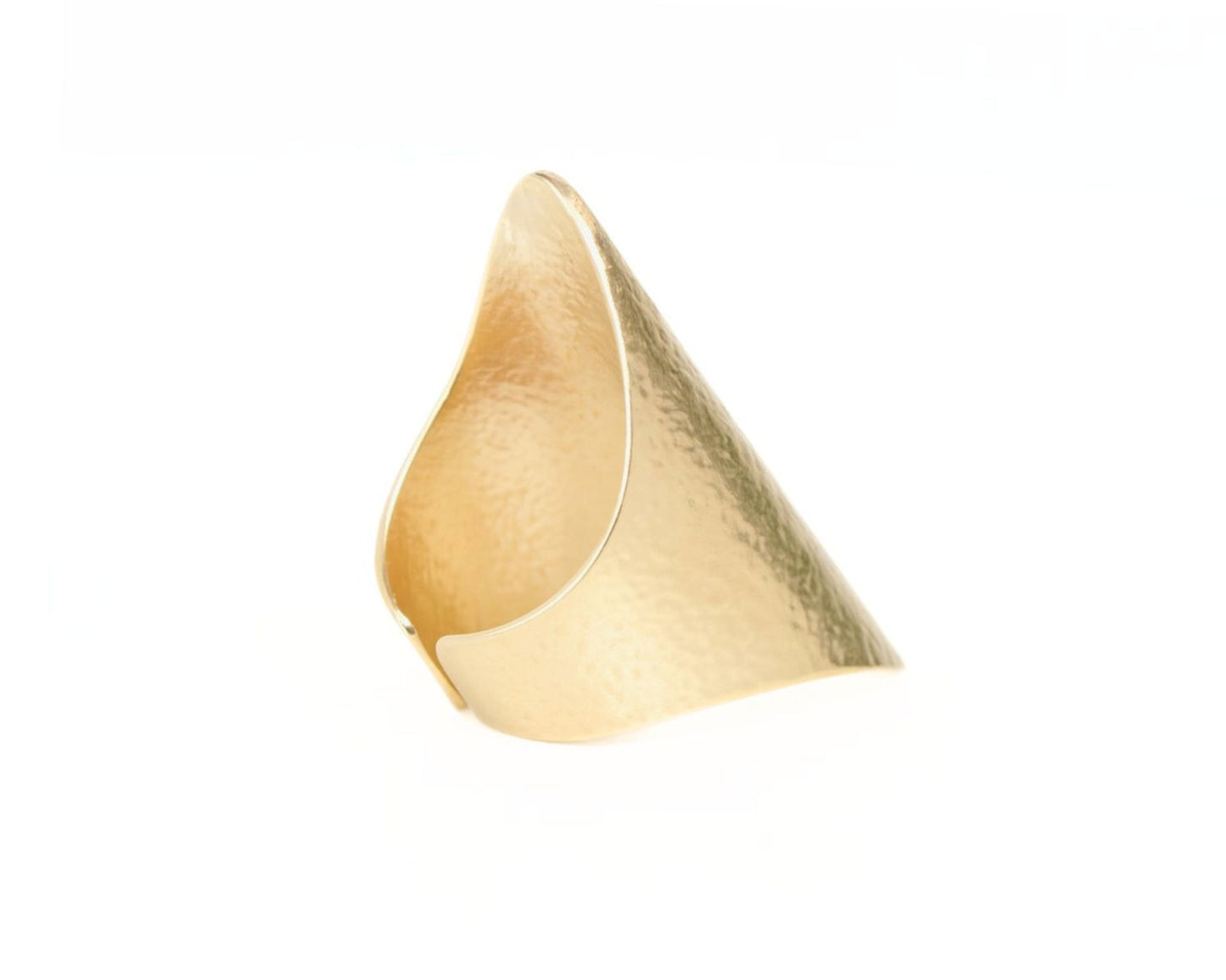 A gold ring with a unique, textured design.