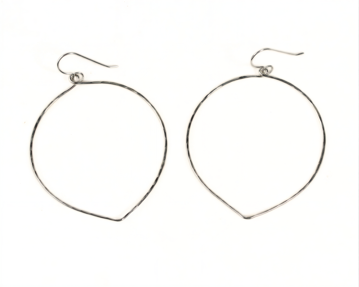 A pair of silver hoop earrings with a simple, minimalist design.
