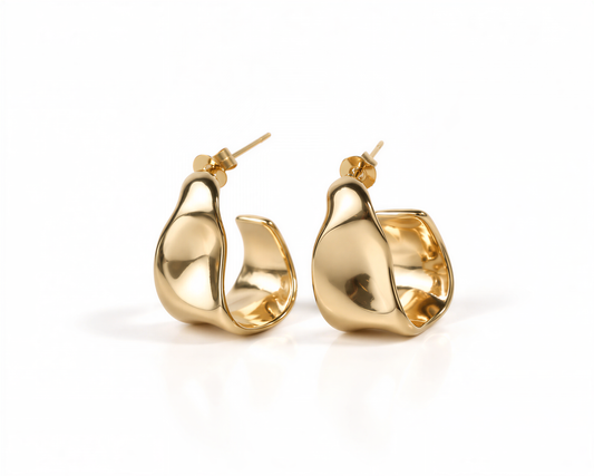 A pair of gold hoop earrings with a curved design.