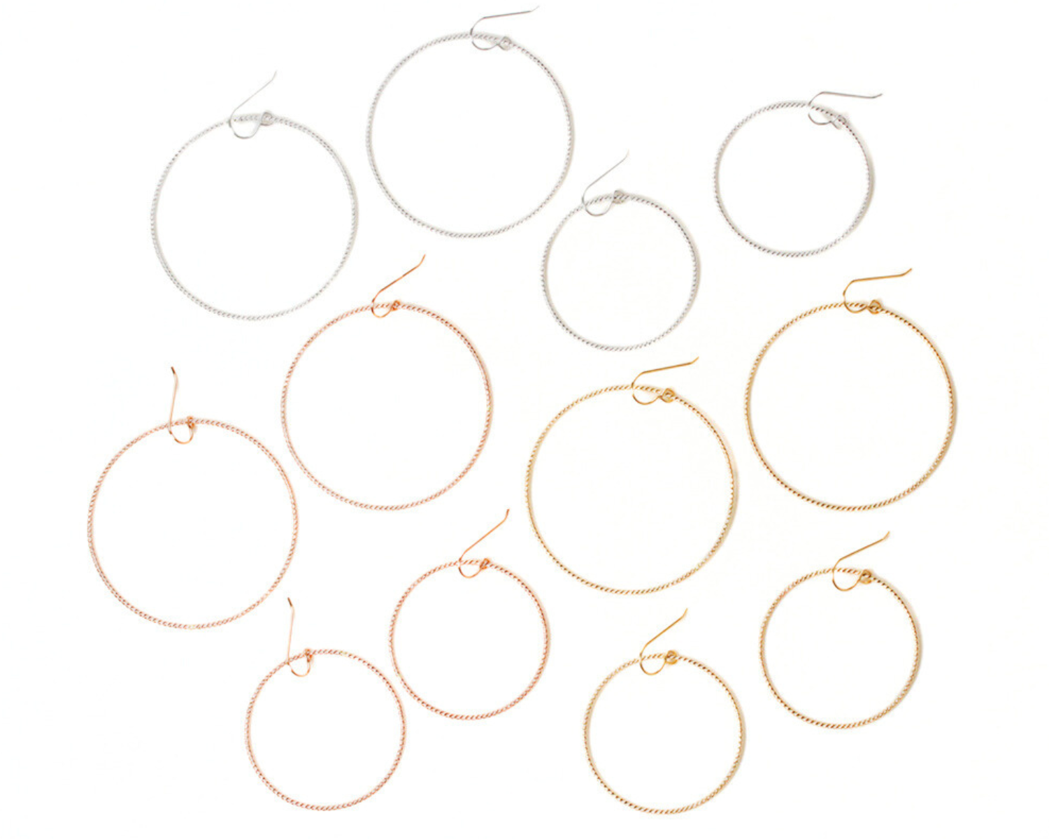 Two sizes and three fine metal options make it easy to find your perfect pair. Select Small, with circles measuring 1.5 inch across, or Large, measuring 2 inches across. Select .925 Sterling Silver, 14 karat Yellow Gold Filled or Rose Gold Filled.