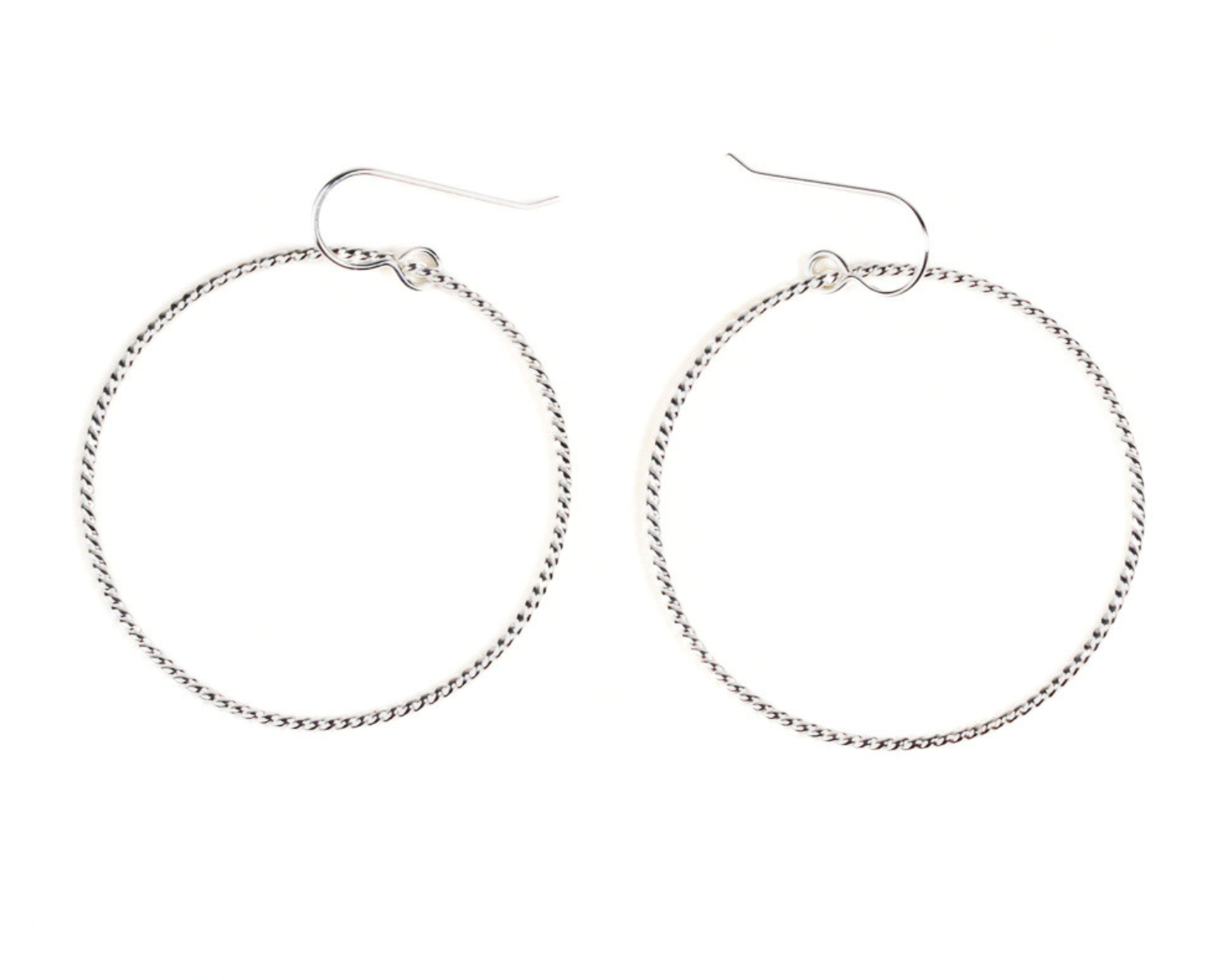 Select your Twisted Hoops in 925 Sterling Silver or 14 karat Yellow Gold Filled or Rose Gold Filled. Select size Small, measuring 1 inch or Medium, 1.5 inches. Bring Twisted Hoop Earrings into your wardrobe and discover an instant everyday favorite.