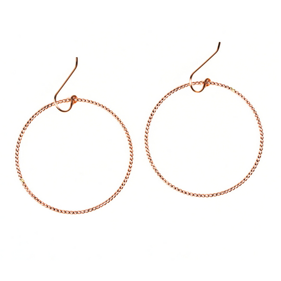 Timeless and elevated, Twisted Hoop Earrings are ideal for any look and all occasions. Each element of our Twisted Hoop Earrings is handcrafted to perfection, from their gleaming fine metal materials to their simple yet impactful design.