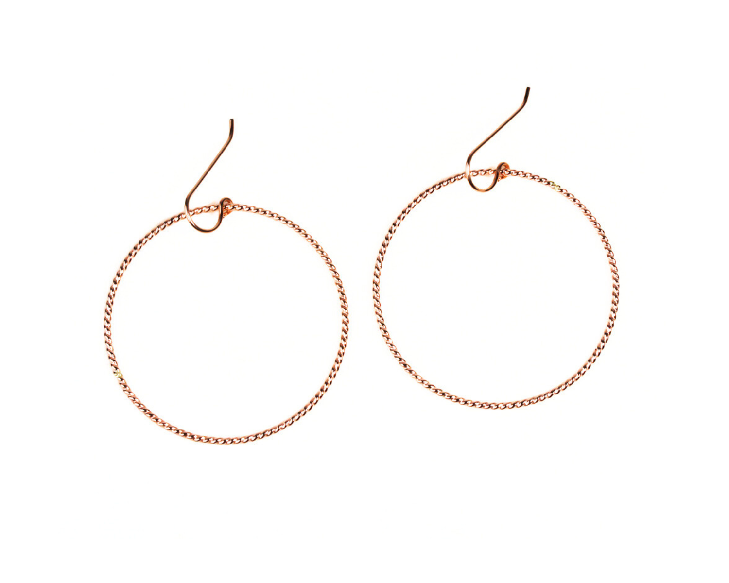 Timeless and elevated, Twisted Hoop Earrings are ideal for any look and all occasions. Each element of our Twisted Hoop Earrings is handcrafted to perfection, from their gleaming fine metal materials to their simple yet impactful design.