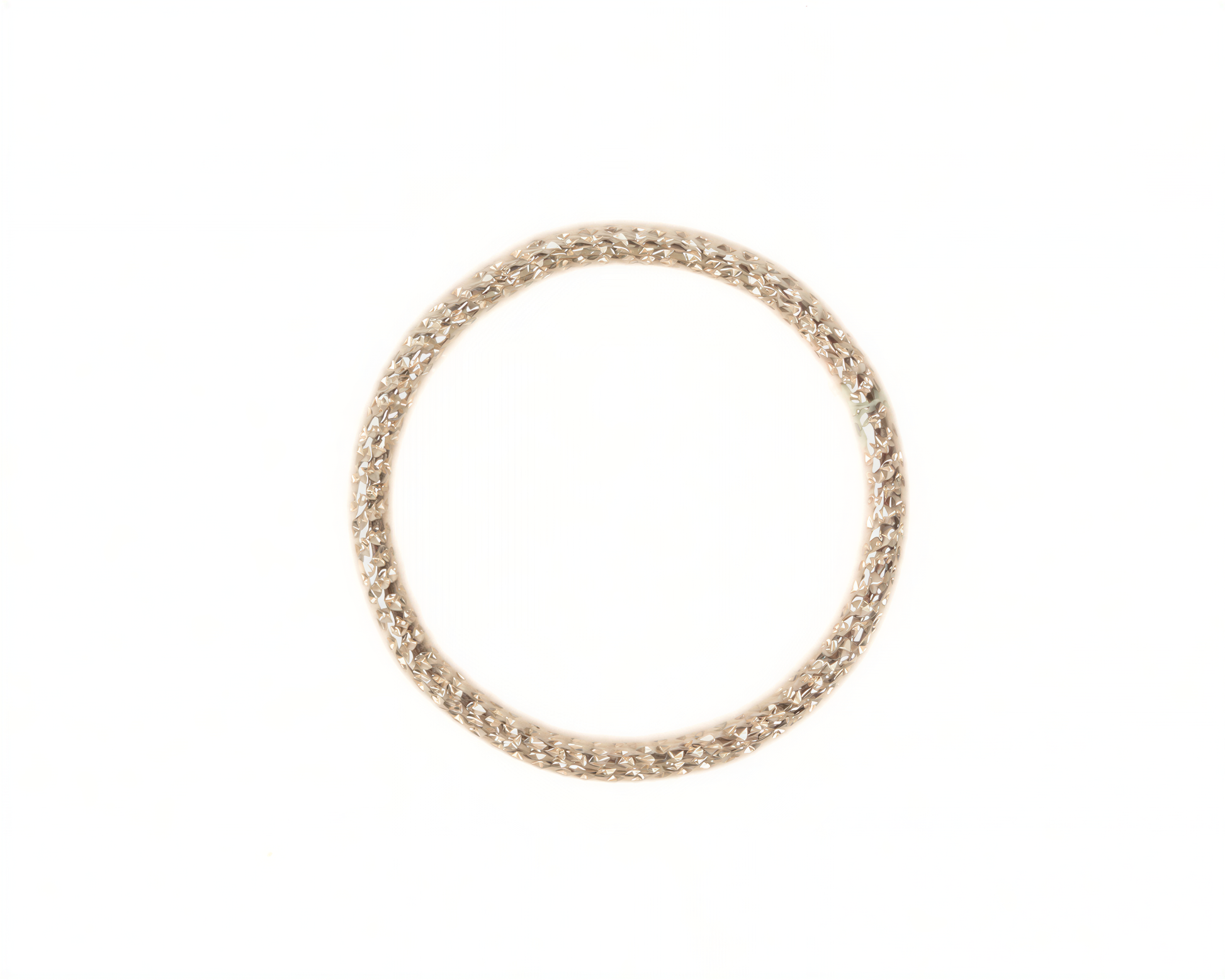 A gold-colored ring with a circular design around the edge.