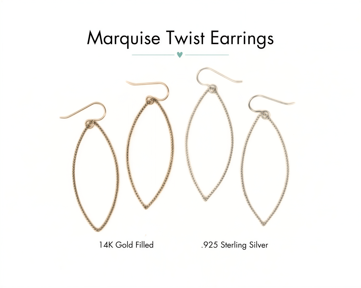 four gold-filled and two sterling silver earrings, each with a unique twist design.