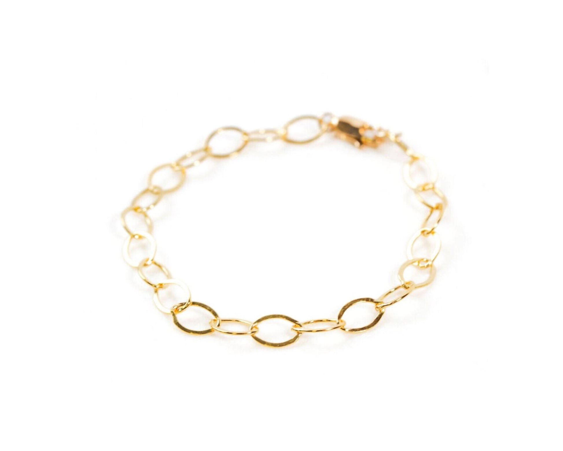 A gold-colored bracelet with a chain-link design.