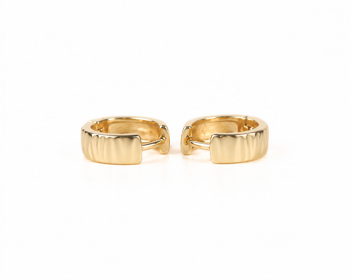Two gold hoop earrings with a textured design are shown against a white background.