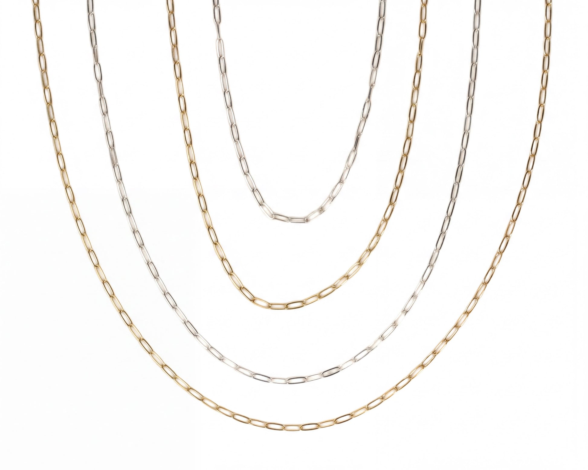 a collection of various chain necklaces, each with different colors and designs, arranged in a circular pattern.