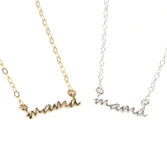 Two necklaces with the word "mama" engraved on them.