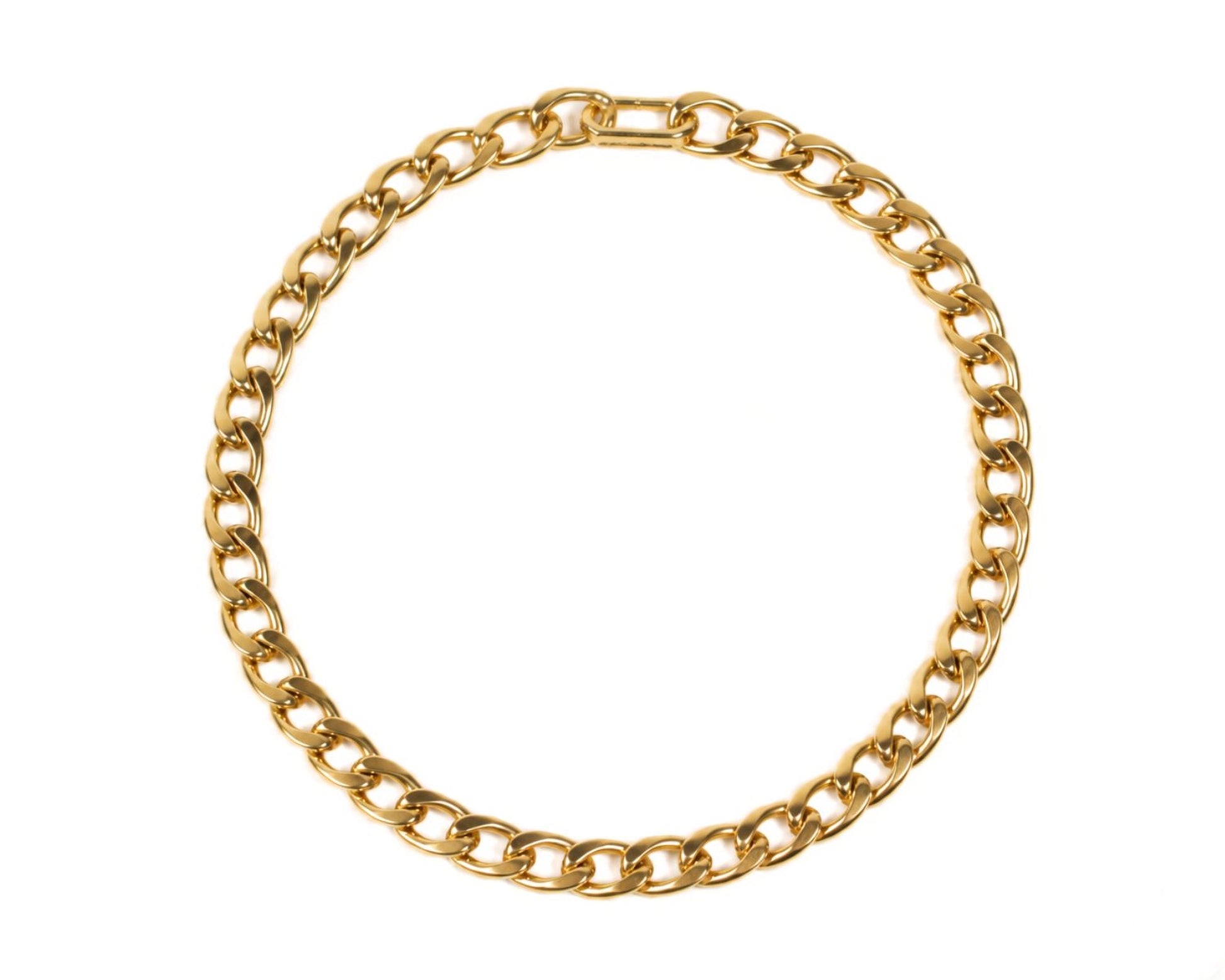 A gold chain necklace with a circular design.