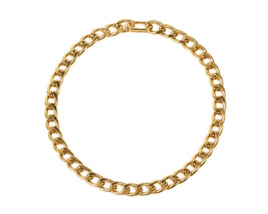 A gold chain necklace with a circular design.