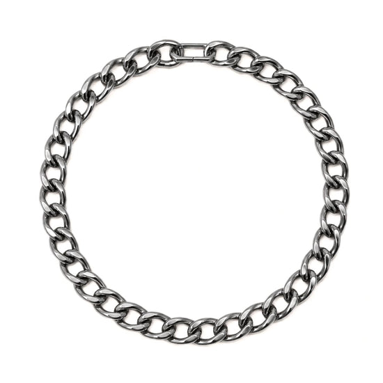 A silver-colored metal necklace with a circular chain design.