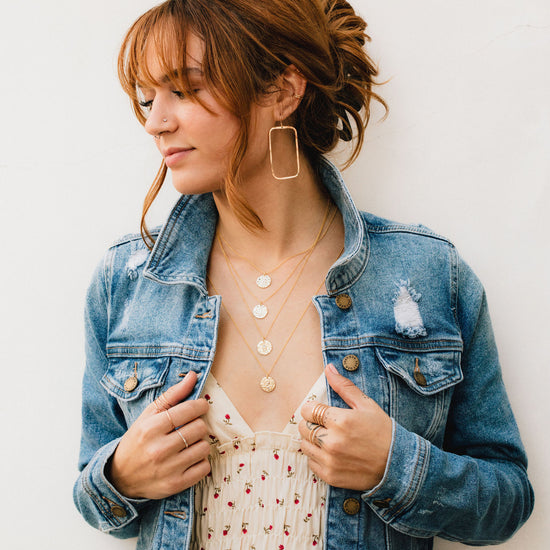 zodiac necklace movement on model